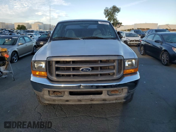 1999 Ford Super Duty F-250 XL with VIN 1FTNX20F3XED60894, listed as a Copart auction lot 74849284 with 148,779 mi miles and Salvage Title. Bid and sale history available at carsss.com. Image 5.
