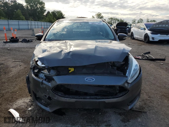 2016 Ford Focus SE with VIN 1FADP3F21GL403961, listed as a Copart auction lot 58027305 with 84,020 mi miles and Salvage title. Bid and sale history available at DreamBid. Image 5.