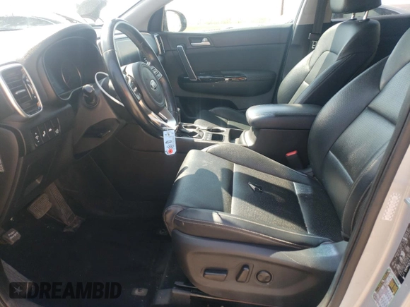 2020 Kia Sportage EX z VIN KNDPNCAC7L7705139, wystawiony jako Copart lot #52307635 z przebiegiem 125 755 mil mil oraz Szkoda całkowita • Salvage title. Historia ofert i sprzedaży dostępna na DreamBid. Obrazek 7.