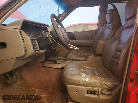 1995 Jeep Grand Cherokee Laredo with VIN 1J4GZ58Y5SC536885, listed as a Copart auction lot 75331944 with 144,319 mi miles and Salvage Title. Bid and sale history available at carsss.com. Image 7.
