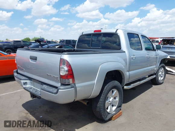 2011 Toyota Tacoma PreRunner with VIN 3TMJU4GN4BM125584, listed as a IAAI auction lot 42781618 with 236,985 mi miles and . Bid and sale history available at DreamBid. Image 4.