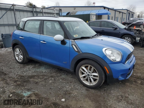 2012 MINI Countryman S with VIN WMWZC5C57CWL62540, listed as a Copart auction lot 43735105 with 86,558 mi miles and Salvage Title. Bid and sale history available at DreamBid. Image 4.
