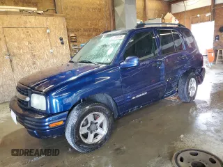 2003 Chevrolet Tracker LT z VIN 2CNBE634836935351, wystawiony jako Copart lot #60396195 z przebiegiem 199 346 mil mil oraz Szkoda całkowita • Salvage title. Historia ofert i sprzedaży dostępna na DreamBid. Obrazek 1.