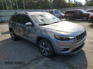 2019 Jeep Cherokee Limited with VIN 1C4PJLDN5KD119967, listed as a Copart auction lot 73510504 with 58,863 mi miles and Salvage Title. Bid and sale history available at DreamBid. Image 4.