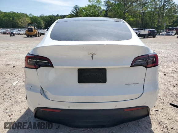 2020 Tesla Model Y Long Range z VIN 5YJYGDEEXLF043910, wystawiony jako Copart lot #54007745 z przebiegiem 102 974 mil mil oraz Szkoda całkowita • Salvage title. Historia ofert i sprzedaży dostępna na DreamBid. Obrazek 6.