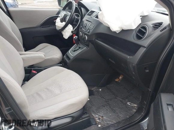 2012 Mazda 5 Touring with VIN JM1CW2CL6C0107233, listed as a IAAI auction lot 41332199 with 130,428 mi miles and . Bid and sale history available at DreamBid. Image 5.