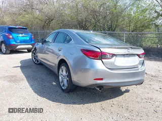 2015 Mazda 6 i Grand Touring with VIN JM1GJ1W52F1195333, listed as a IAAI auction lot 42014865 with 107,039 mi miles and . Bid and sale history available at DreamBid. Image 3.