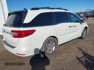 2018 Honda Odyssey EX-L with VIN 5FNRL6H75JB044422, listed as a IAAI auction lot 41730576 with 120,587 mi miles and . Bid and sale history available at DreamBid. Image 4.