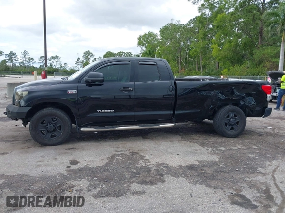 2011 Toyota Tundra 2WD Truck SR with VIN 5TFTY5F14BX007238, listed as a IAAI auction lot 41663289 with 126,499 mi miles. Bid and sale history available at carsss.com. Image 14.