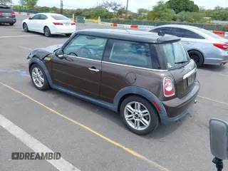 2012 MINI Hardtop with VIN WMWSU3C58CT261401, listed as a IAAI auction lot 42191548 with 96,115 mi miles and . Bid and sale history available at DreamBid. Image 3.
