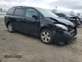 2015 Toyota Sienna LE AAS with VIN 5TDKK3DC5FS550597, listed as a Copart auction lot 51458215 with 74,090 mi miles and Salvage Title. Bid and sale history available at DreamBid. Image 4.