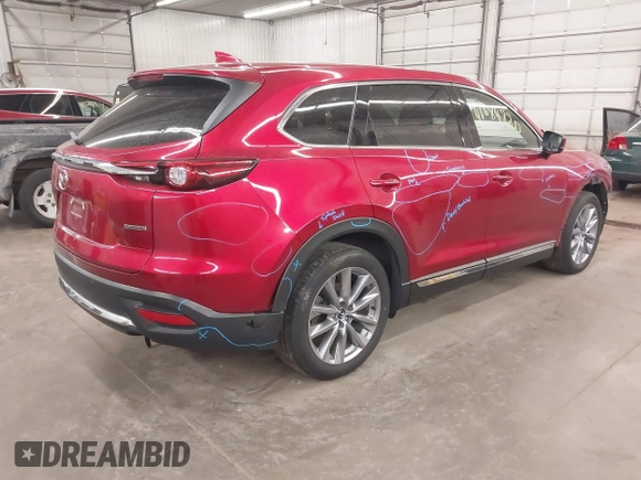 2023 Mazda CX-9 Carbon Edition with VIN JM3TCBDY2P0633133, listed as a IAAI auction lot 41684820 with 23,739 mi miles and . Bid and sale history available at carsss.com. Image 4.