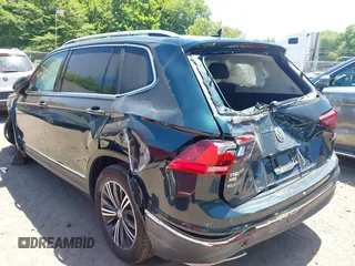2018 Volkswagen Tiguan SEL with VIN 3VV2B7AX9JM058518, listed as a IAAI auction lot 42558129 with 82,807 mi miles and . Bid and sale history available at DreamBid. Image 3.