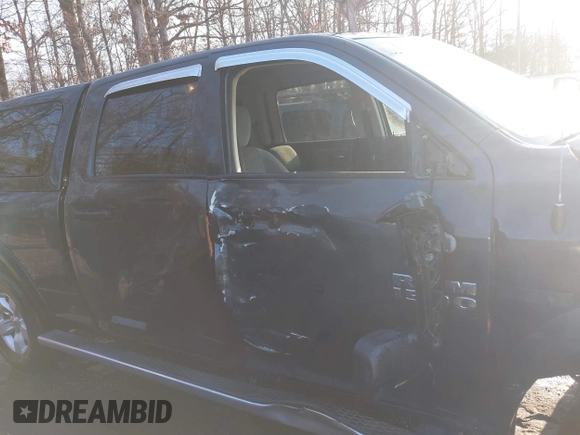 2015 Ram 1500 Big Horn with VIN 1C6RR7TM7FS569176, listed as a IAAI auction lot 41474950 with 220,742 mi miles and . Bid and sale history available at DreamBid. Image 13.