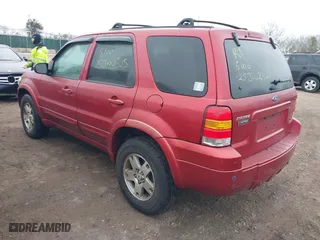 2005 Ford Escape Limited with VIN 1FMYU94155KA52665, listed as a IAAI auction lot 41736416 with 999,999 mi miles. Bid and sale history available at carsss.com. Image 3.