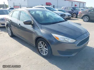 2018 Ford Focus SE with VIN 1FADP3F24JL207231, listed as a IAAI auction lot 42024366 with 134,446 mi miles. Bid and sale history available at carsss.com. Image 1.