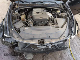 2014 Cadillac CTS RWD z VIN 1G6AP5SX6E0193868, wystawiony jako Copart lot #51795485 z przebiegiem 100 039 mil mil oraz Szkoda całkowita • Salvage title. Historia ofert i sprzedaży dostępna na DreamBid. Obrazek 11.