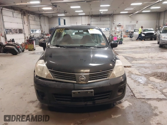 2007 Nissan Versa 1.8 SL with VIN 3N1BC11E47L411983, listed as a IAAI auction lot 41391334 with 201,830 mi miles. Bid and sale history available at carsss.com. Image 13.