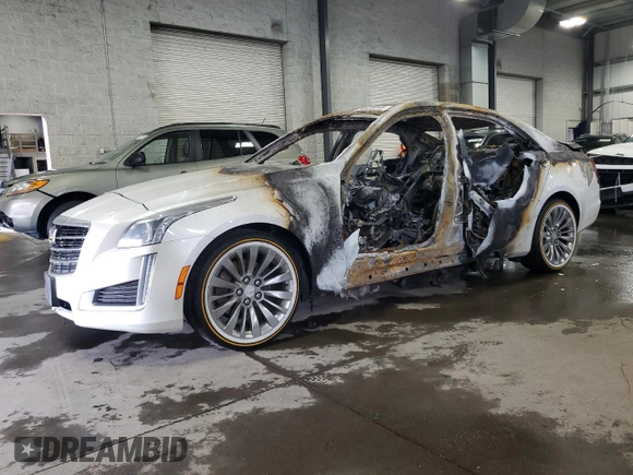 2015 Cadillac CTS Luxury AWD with VIN 1G6AX5SX2F0143051, listed as a Copart auction lot 54432315 with Not provided miles and Salvage title. Bid and sale history available at DreamBid. Image 1.