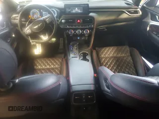 2023 Genesis G70 3.3T z VIN KMTG54TE1PU132414, wystawiony jako Copart lot #57120935 z przebiegiem 22 360 mil mil oraz Szkoda całkowita • Salvage title. Historia ofert i sprzedaży dostępna na DreamBid. Obrazek 8.
