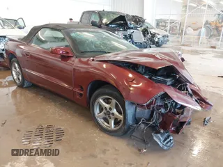2001 Pontiac Firebird with VIN 2G2FS32K112121774, listed as a IAAI auction lot 41357815 with 1 mi miles. Bid and sale history available at carsss.com. Image 1.