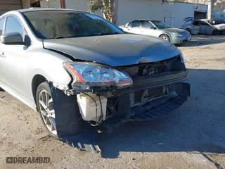 2013 Nissan Sentra SR with VIN 3N1AB7AP5DL666219, listed as a IAAI auction lot 41669972 with 205,718 mi miles. Bid and sale history available at carsss.com. Image 6.