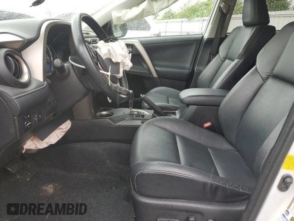 2014 Toyota RAV4 Limited with VIN 2T3DFREV2EW176558, listed as a Copart auction lot 56998885 with 180,202 mi miles and Salvage title. Bid and sale history available at DreamBid. Image 7.