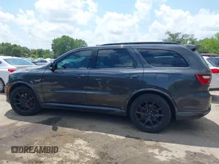 2024 Dodge Durango SRT 392 Plus z VIN 1C4SDJGJ3RC175355, wystawiony jako IAAI lot #42744390 z przebiegiem 8 956 mil mil oraz . Historia ofert i sprzedaży dostępna na DreamBid. Obrazek 13.
