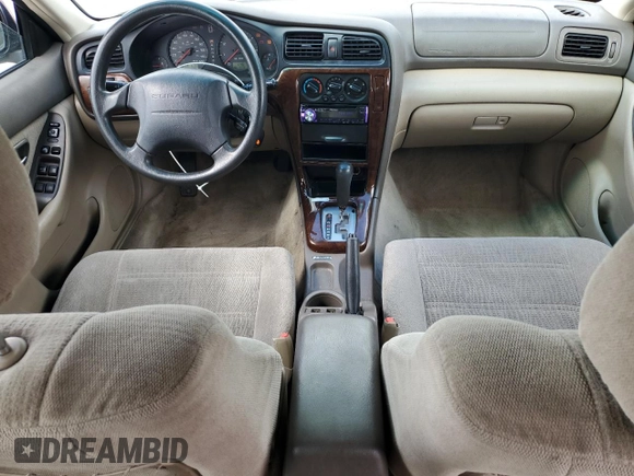 2001 Subaru Legacy Outback with VIN 4S3BH665217678037, listed as a Copart auction lot 49513005 with 193,477 mi miles and Salvage title. Bid and sale history available at DreamBid. Image 8.