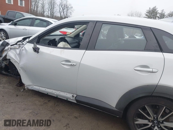 2017 Mazda CX-3 Touring with VIN JM1DKFC77H0155101, listed as a IAAI auction lot 41722040 with 92,653 mi miles. Bid and sale history available at carsss.com. Image 15.