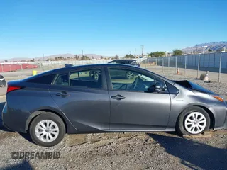 2020 Toyota Prius L Eco z VIN JTDKARFU2L3120891, wystawiony jako IAAI lot #41318597 z przebiegiem 79 848 mil mil oraz . Historia ofert i sprzedaży dostępna na DreamBid. Obrazek 13.