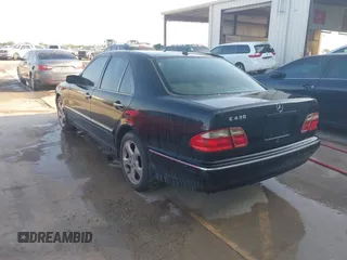 2002 Mercedes-Benz E 320 with VIN WDBJF70J02B477523, listed as a IAAI auction lot 42136739 with 251,354 mi miles and . Bid and sale history available at carsss.com. Image 3.