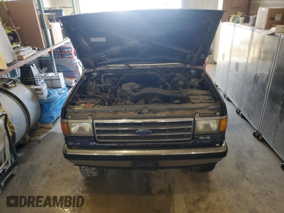 1990 Ford Bronco Custom z VIN 1FMEU15H7LLB32721, wystawiony jako Copart lot #84829284 z przebiegiem 171 424 mil mil oraz Czysty tytuł • Clean title. Historia ofert i sprzedaży dostępna na DreamBid. Obrazek 12.