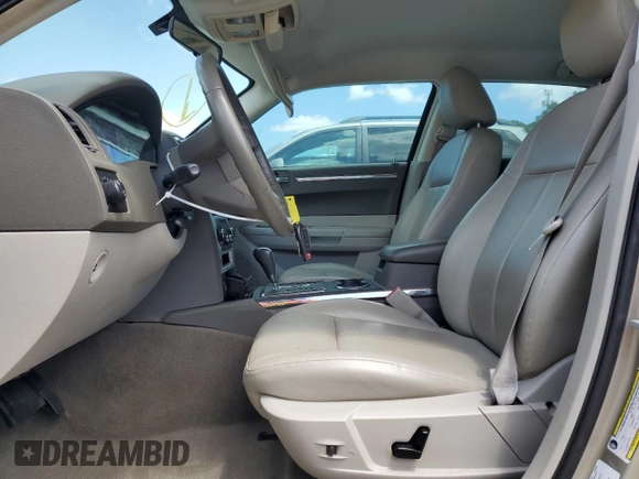 2009 Chrysler 300 Touring with VIN 2C3KA53V69H592639, listed as a Copart auction lot 55209775 with 107,751 mi miles and Salvage Title. Bid and sale history available at DreamBid. Image 7.