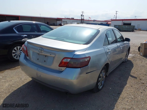 2007 Toyota Camry CE with VIN JTNBE46K773058525, listed as a IAAI auction lot 41927357 with 245,984 mi miles. Bid and sale history available at carsss.com. Image 6.
