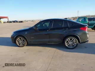 2018 BMW X4 xDrive28i with VIN 5UXXW3C59J0T80560, listed as a IAAI auction lot 41734915 with 122,850 mi miles. Bid and sale history available at carsss.com. Image 14.