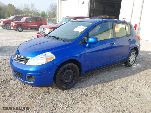 2012 Nissan Versa S with VIN 3N1BC1CP2CK284357, listed as a IAAI auction lot 41911223 with 164,806 mi miles. Bid and sale history available at carsss.com. Image 2.