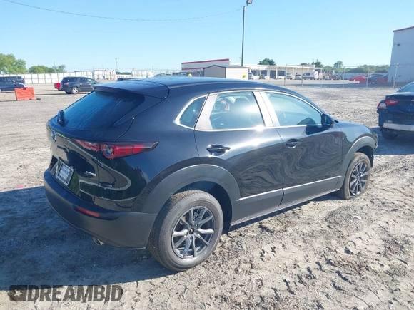 2023 Mazda CX-30 S with VIN 3MVDMBAM7PM528546, listed as a IAAI auction lot 42191598 with 18,680 mi miles and . Bid and sale history available at DreamBid. Image 4.