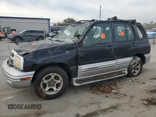 2001 Chevrolet Tracker LT with VIN 2CNBE634416919578, listed as a Copart auction lot 76677934 with Not provided miles and Salvage title. Bid and sale history available at DreamBid. Image 1.