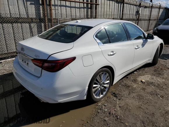 2023 Infiniti Q50 Luxe with VIN JN1EV7BP6PM511826, listed as a Copart auction lot 86655224 with 23,681 mi miles and Salvage Title. Bid and sale history available at DreamBid. Image 3.