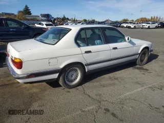 1993 BMW 7 Series with VIN WBAGD4323PDE63700, listed as a Copart auction lot 79675024 with 248,056 mi miles and Clean title. Bid and sale history available at DreamBid. Image 3.