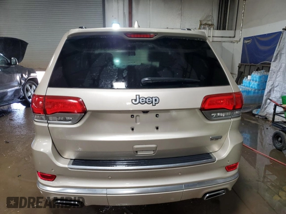 2015 Jeep Grand Cherokee Summit z VIN 1C4RJFJG1FC628532, wystawiony jako Copart lot #52546755 z przebiegiem 107 700 mil mil oraz Szkoda całkowita • Salvage title. Historia ofert i sprzedaży dostępna na DreamBid. Obrazek 6.