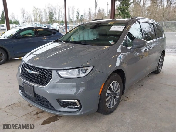 2021 Chrysler Pacifica Hybrid Touring L with VIN 2C4RC1L78MR581255, listed as a IAAI auction lot 41913443 with 71,193 mi miles. Bid and sale history available at carsss.com. Image 2.