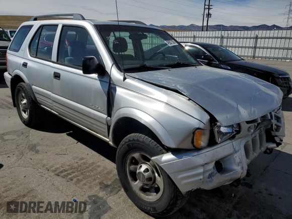 2000 Isuzu Rodeo z VIN 4S2DM58W8Y4331154, wystawiony jako Copart lot #49507535 z przebiegiem 198 476 mil mil oraz Szkody całkowita. Historia ofert i sprzedaży dostępna na DreamBid. Obrazek 4.