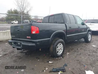 2003 GMC Sonoma SLS with VIN 1GTDT13X63K182058, listed as a IAAI auction lot 41455779 with 186,503 mi miles. Bid and sale history available at carsss.com. Image 4.