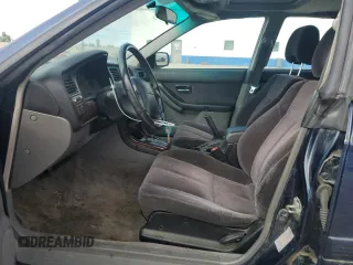 2003 Subaru Legacy L with VIN 4S3BE635337206073, listed as a Copart auction lot 54269664 with 206,230 mi miles and Salvage title. Bid and sale history available at DreamBid. Image 7.