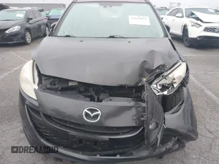 2013 Mazda 5 Grand Touring with VIN JM1CW2DL9D0158077, listed as a IAAI auction lot 42182079 with 153,431 mi miles and . Bid and sale history available at DreamBid. Image 6.