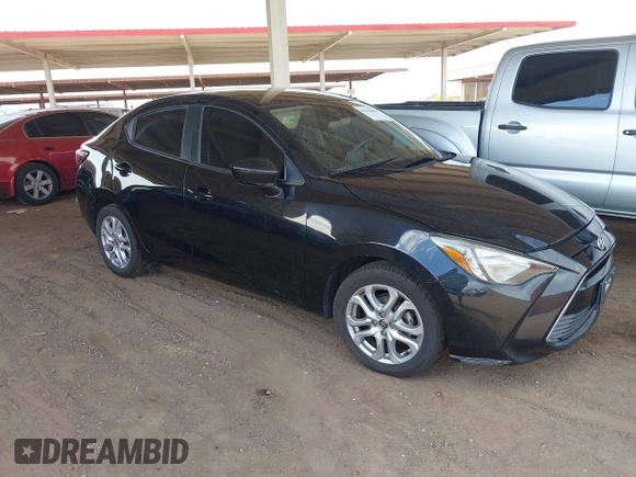 2016 Scion iA z VIN 3MYDLBZV2GY102744, wystawiony jako IAAI lot #42118048 z przebiegiem 128 772 mil mil oraz . Historia ofert i sprzedaży dostępna na DreamBid. Obrazek 1.