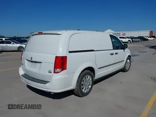 2014 Ram Cargo Van with VIN 2C4RRGAG2ER251245, listed as a IAAI auction lot 42038553 with 230,962 mi miles and . Bid and sale history available at DreamBid. Image 4.