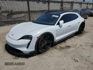 2022 Porsche Taycan 4 z VIN WP0BA2Y19NSA67581, wystawiony jako Copart lot #64120325 z przebiegiem 6 776 mil mil oraz Szkoda całkowita • Salvage title. Historia ofert i sprzedaży dostępna na DreamBid. Obrazek 1.